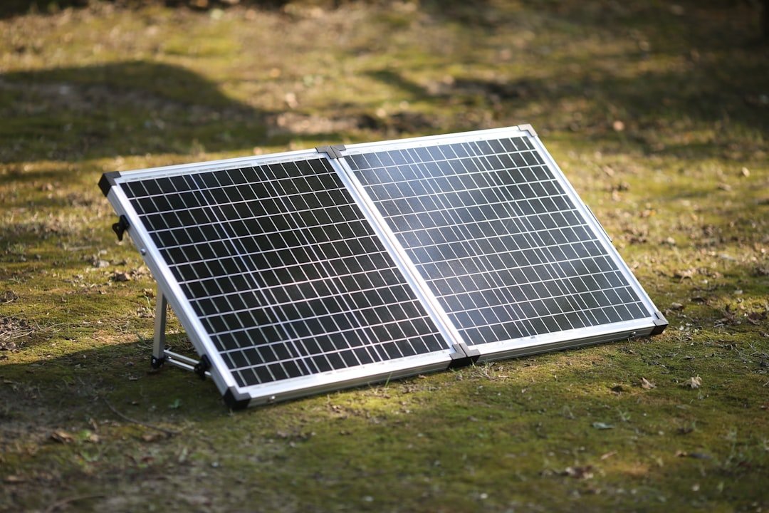 services-03 a-solar-panel-on-a-grass-field-ntj-nw7oua